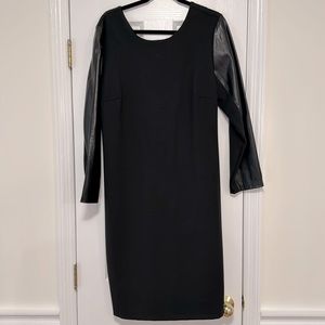 Black mid length dress with faux leather sleeves